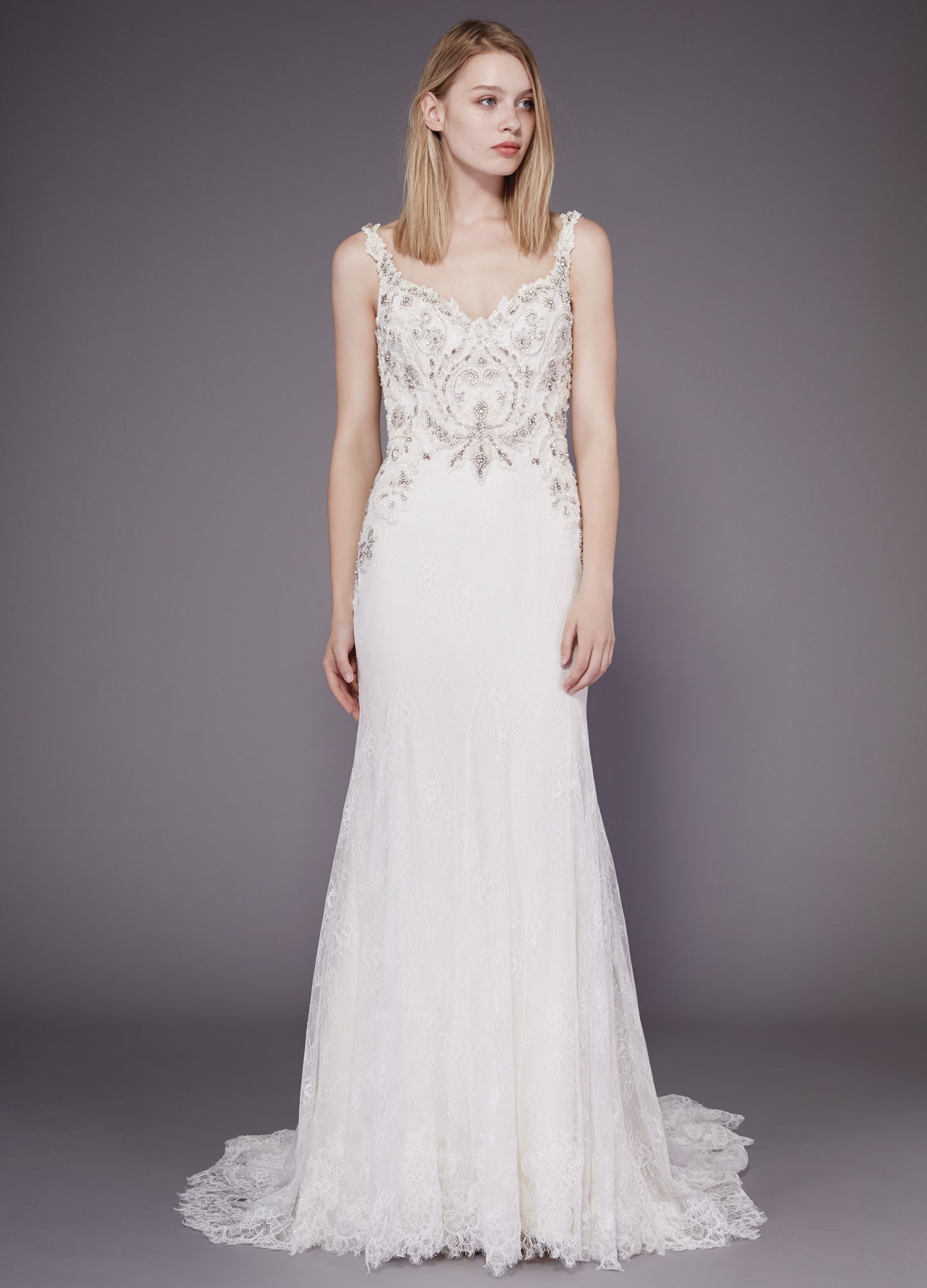 white lace sleeveless gown