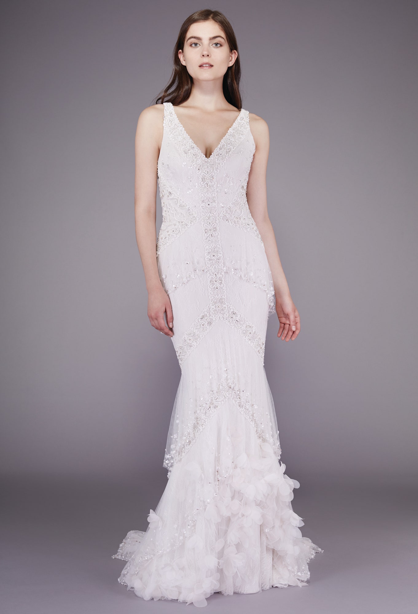 white embellished sleeveless gown