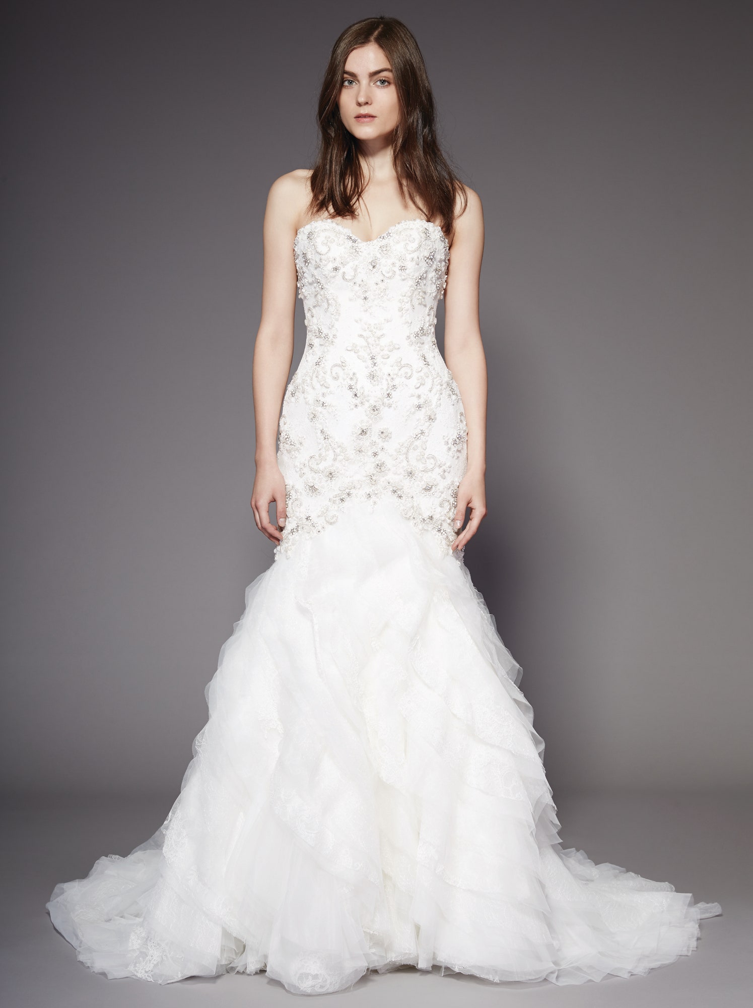 white strapless ruffled gown