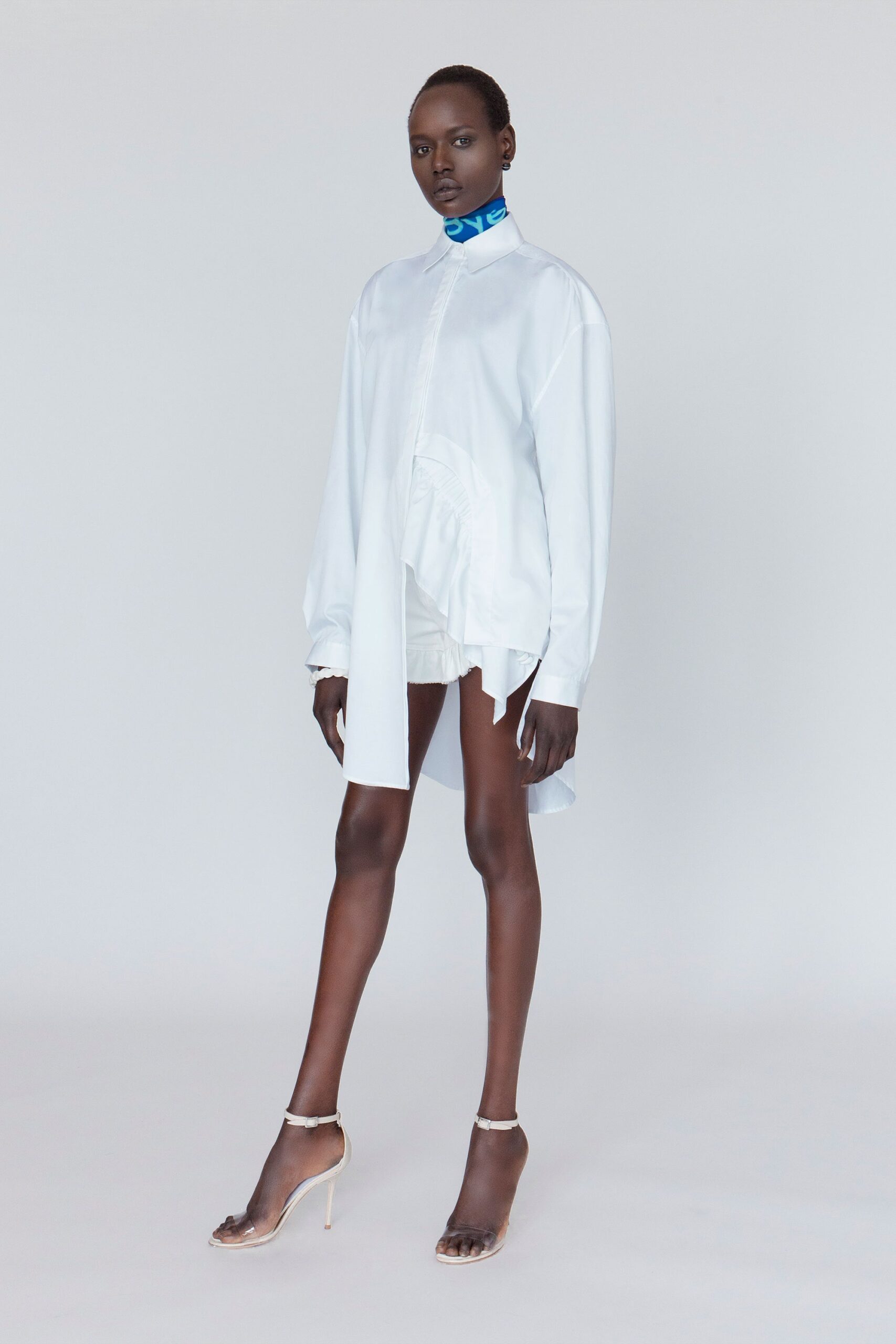 white cotton long-sleeve collared relaxed ruffled short shirt