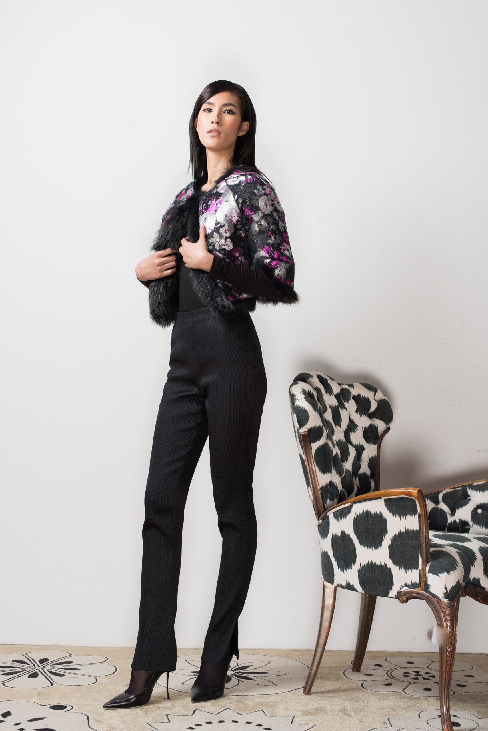 black fitted jacket with floral detail