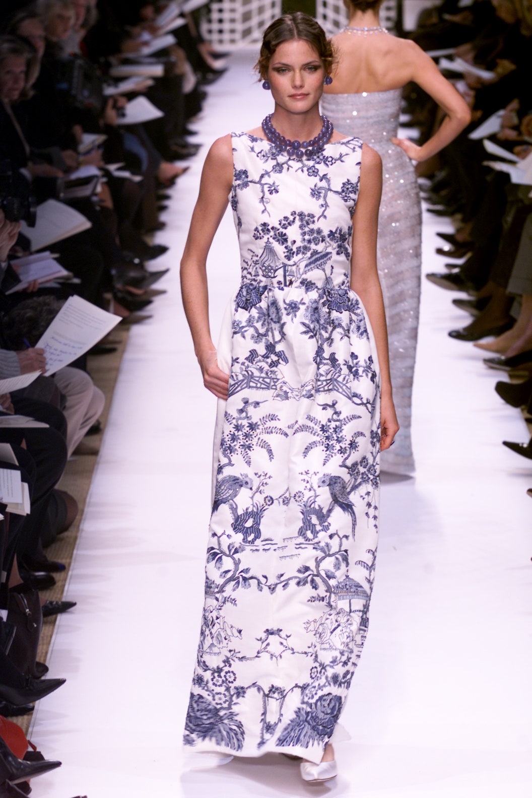 white silk embroidered gown