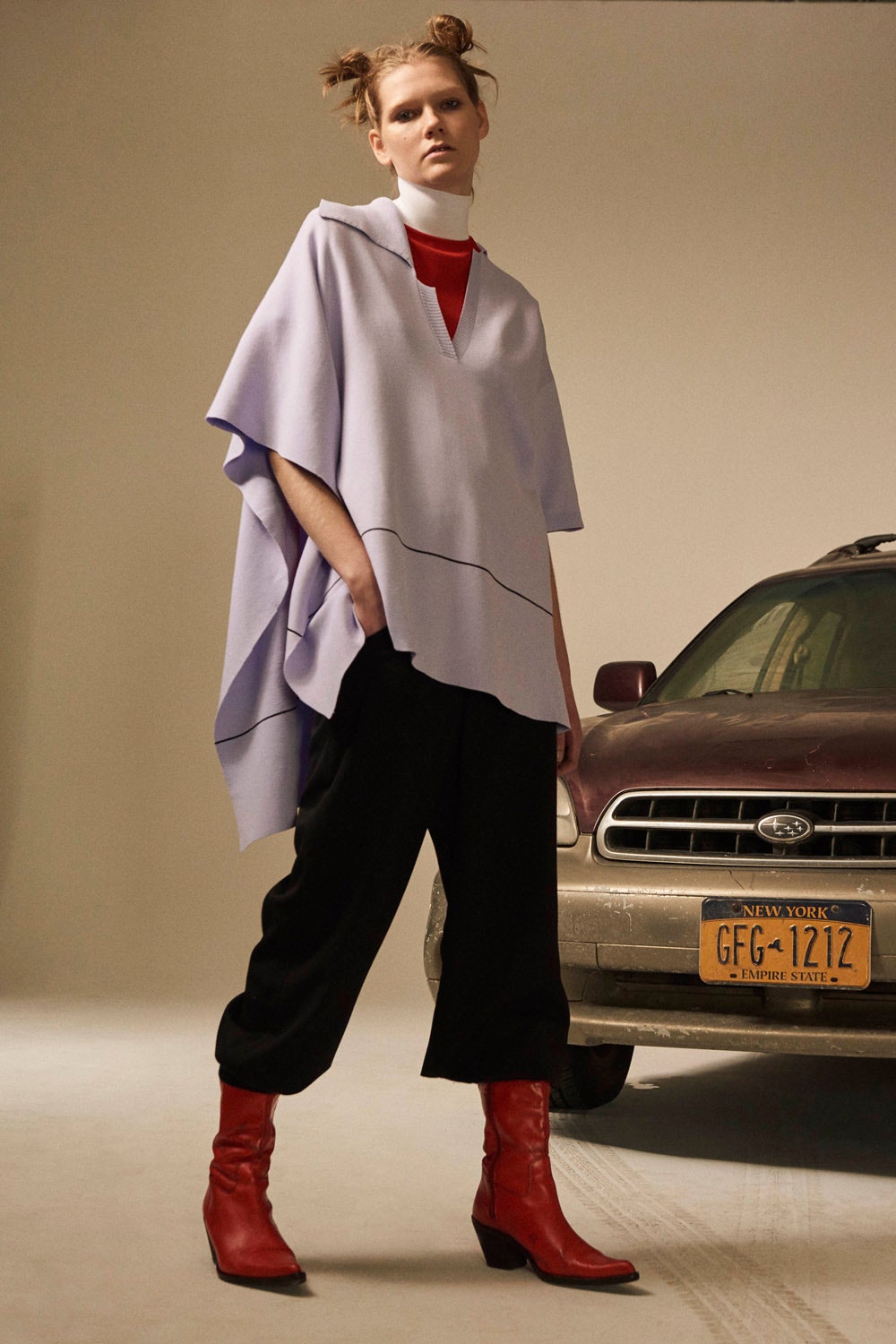 lavender poncho with red top