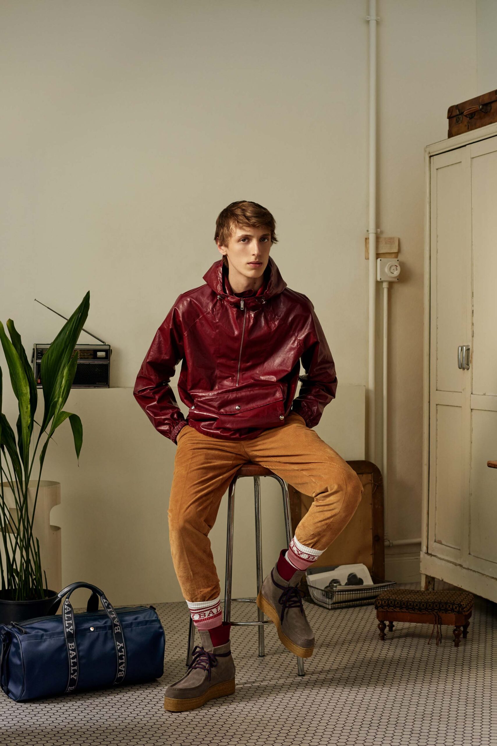 red vinyl hooded jacket