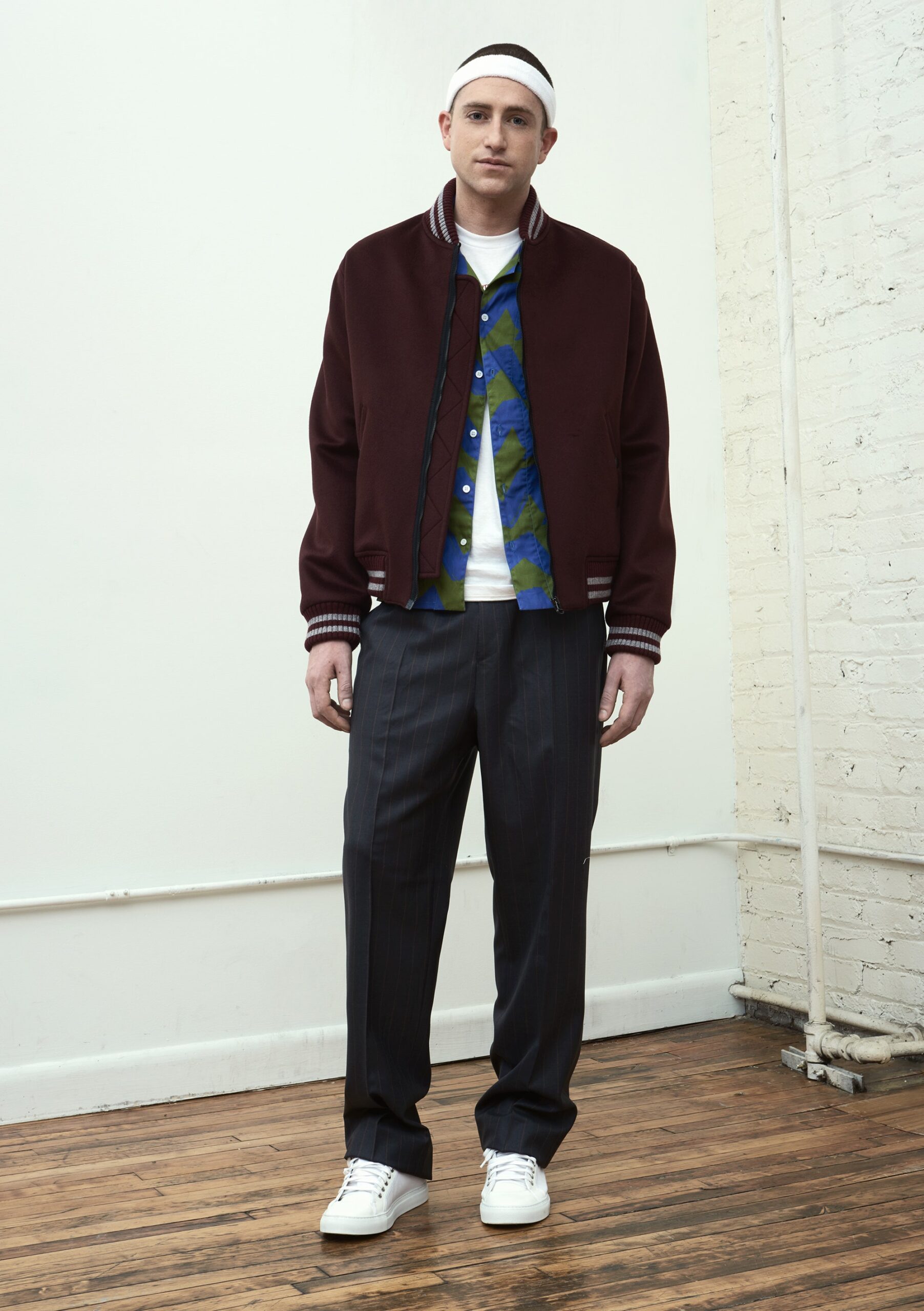 burgundy jacket with gray pants