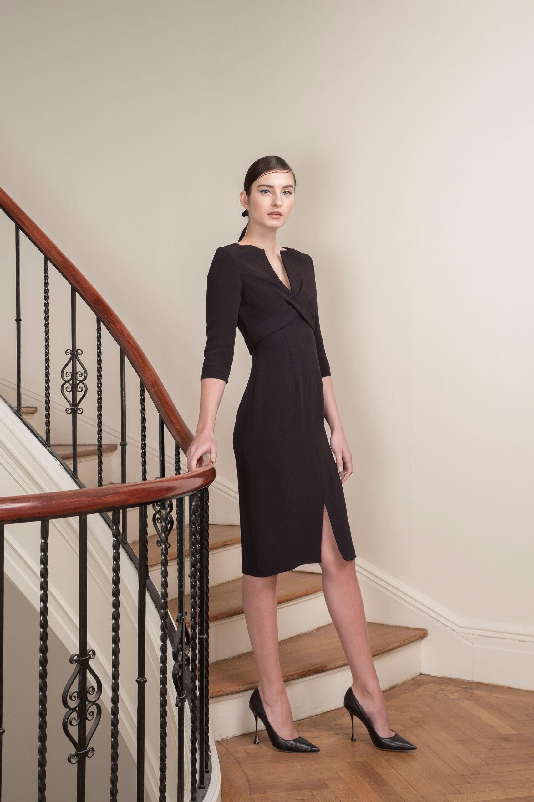 black fitted midi dress