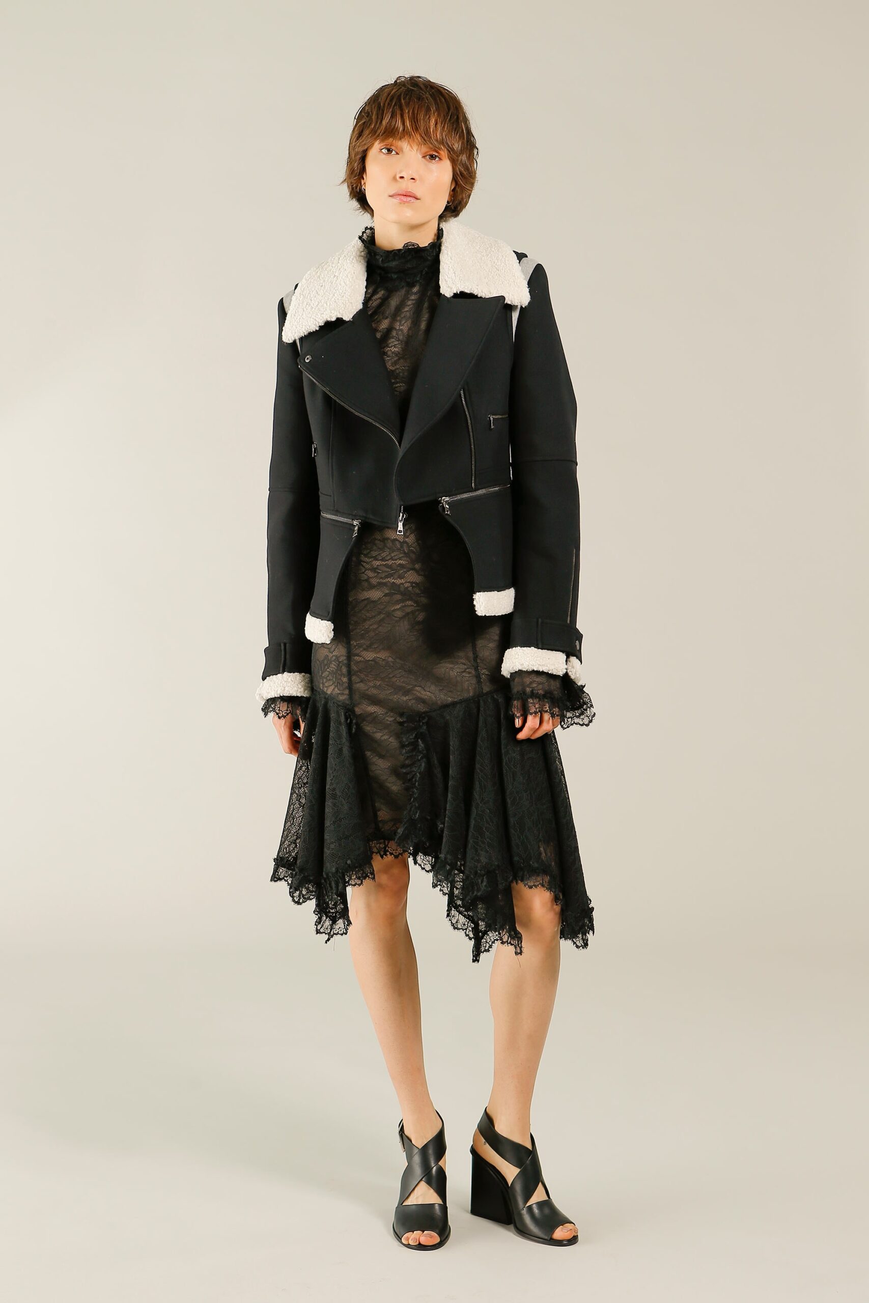 black leather jacket and lace dress