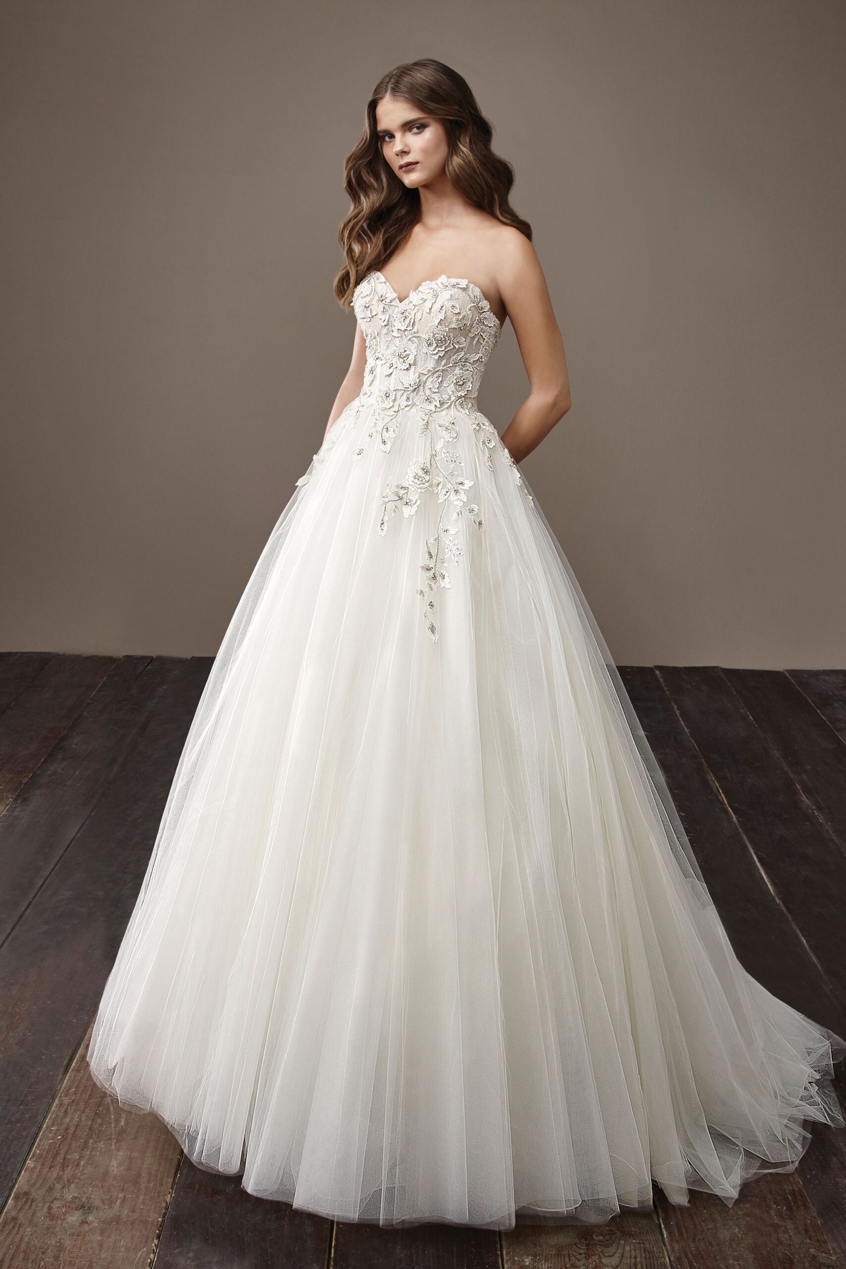 white strapless embroidered gown
