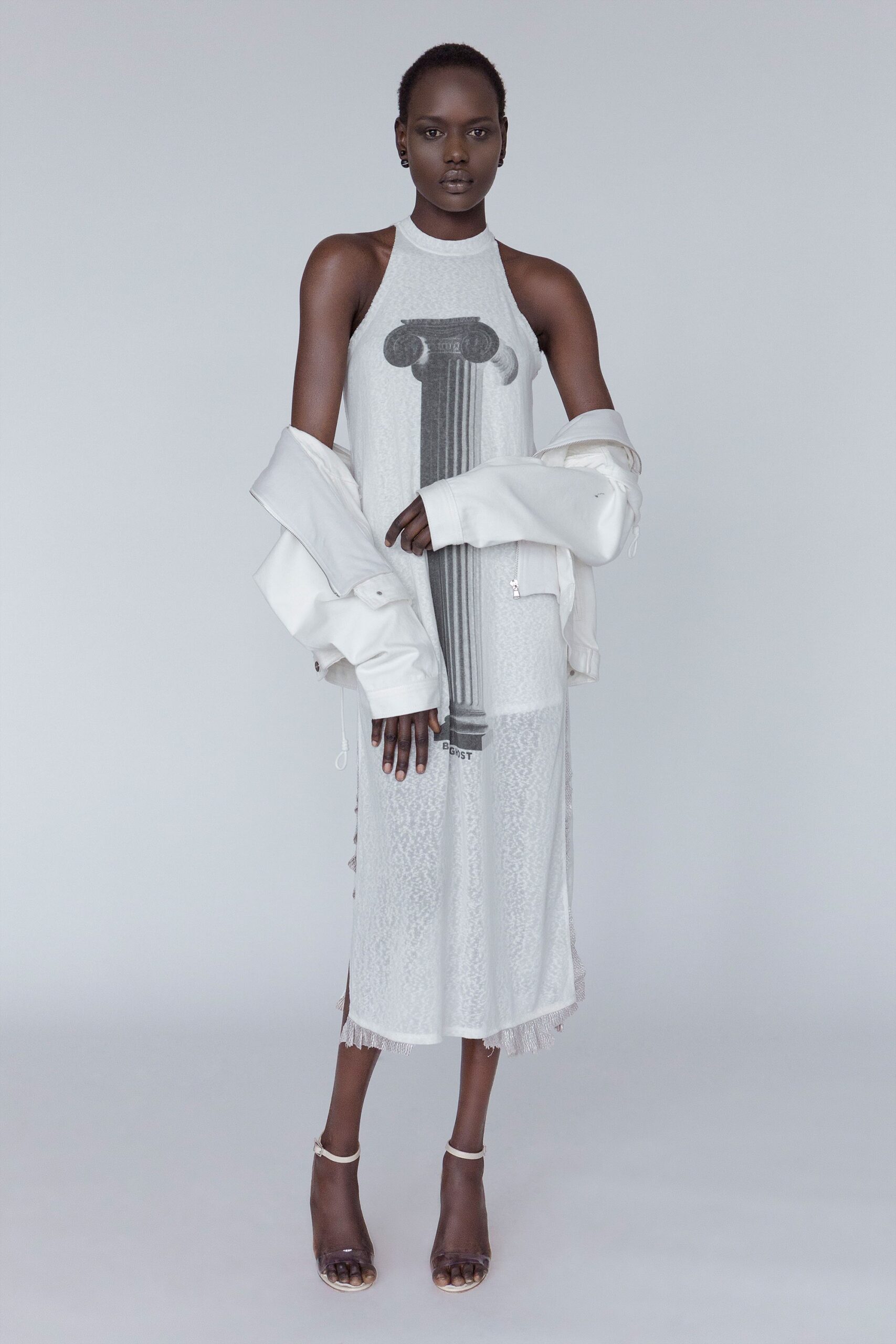 white fitted dress with oversized jacket