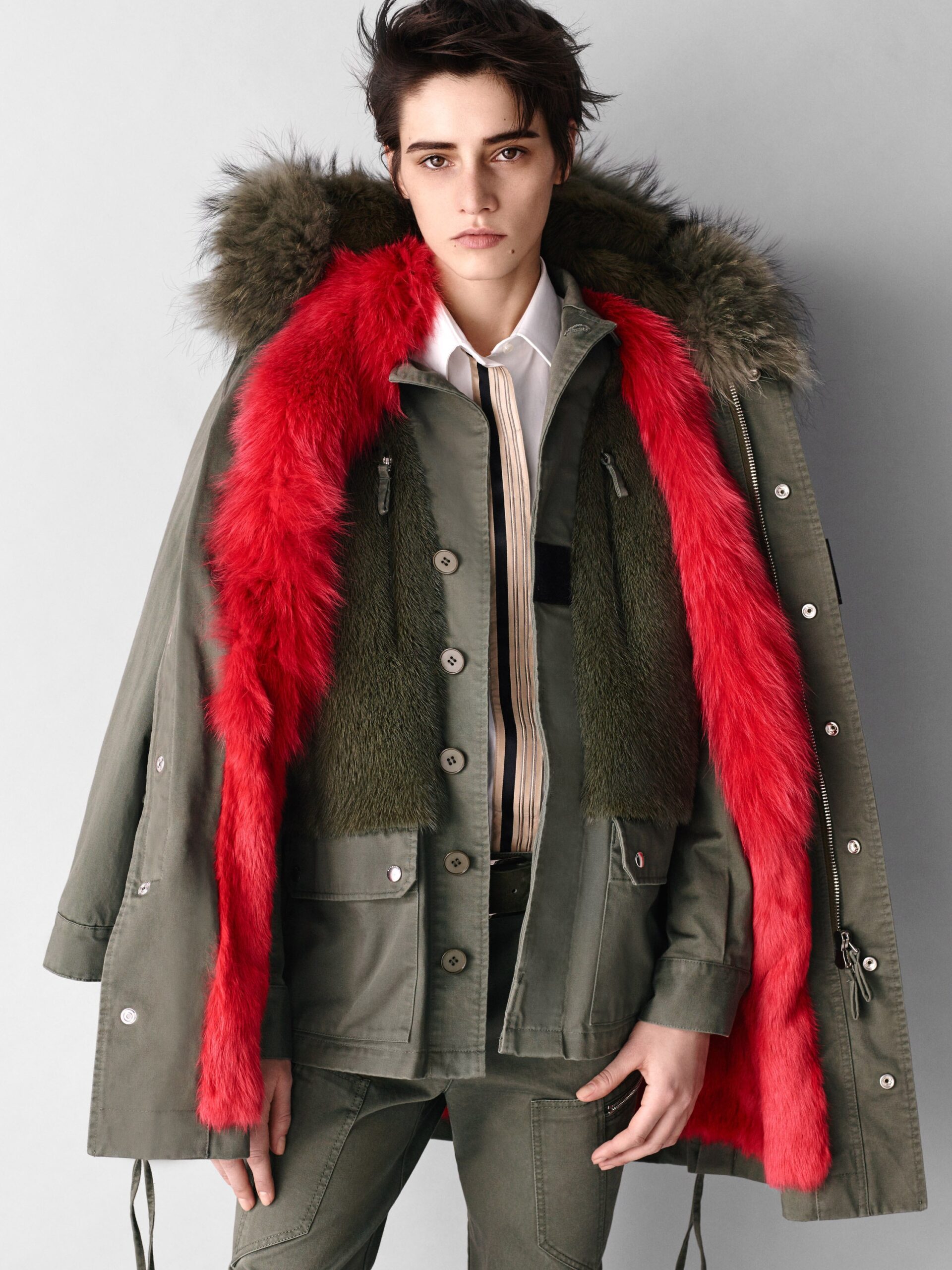 green parka with faux-fur and white shirt