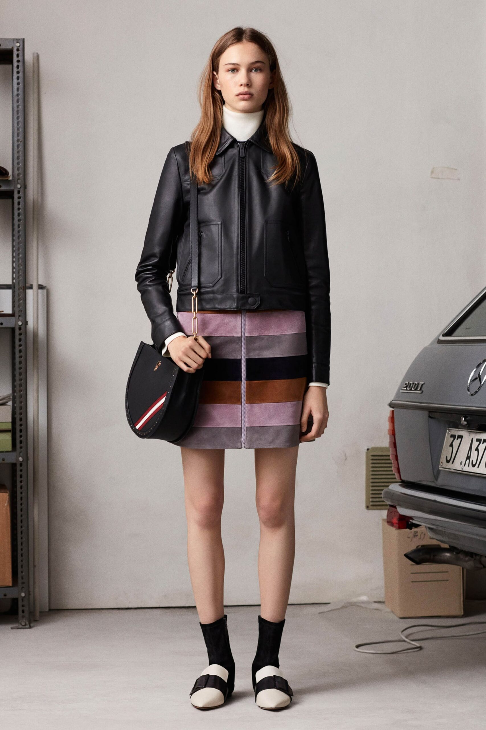 black leather fitted jacket and pencil skirt