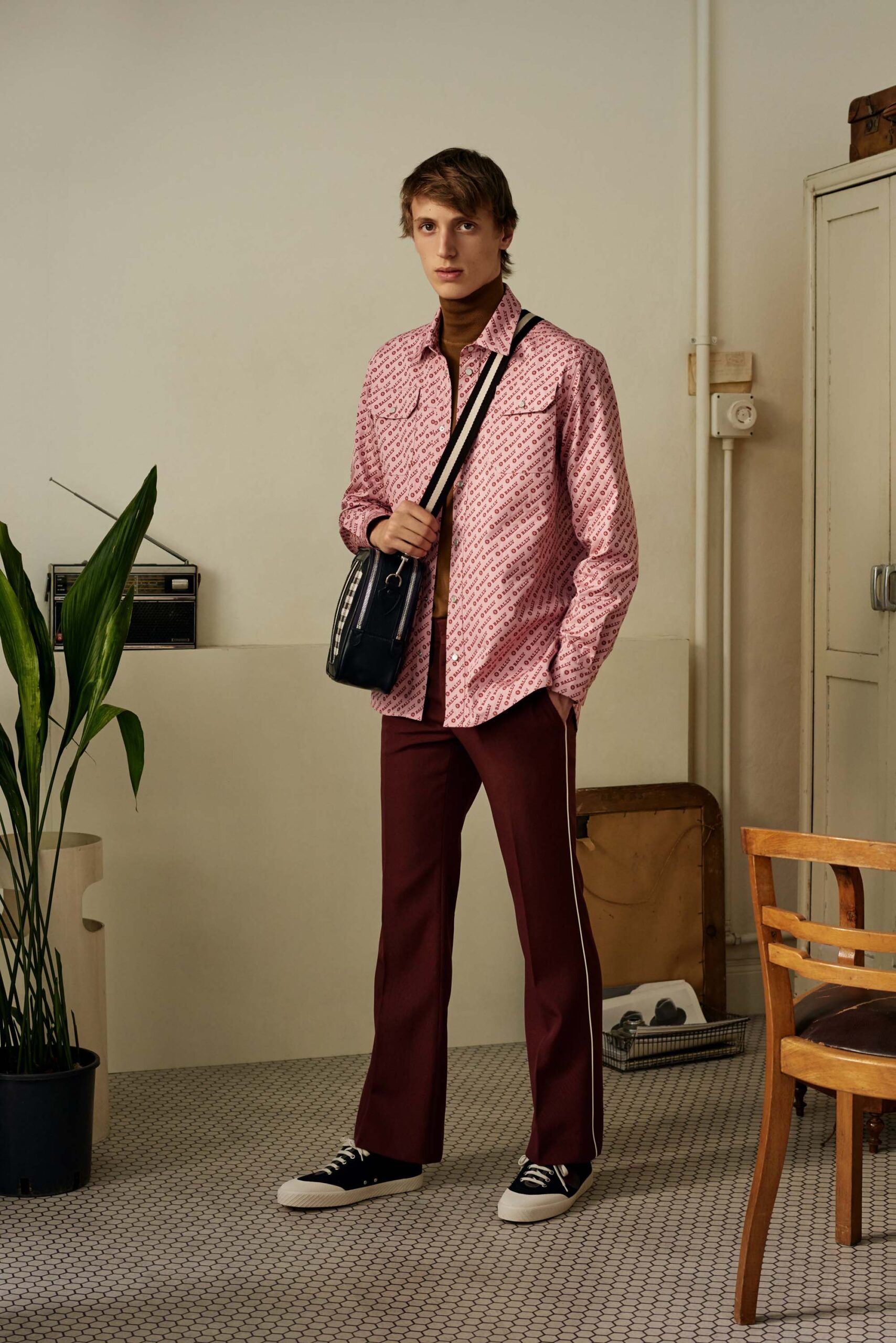 pink printed shirt with maroon pants