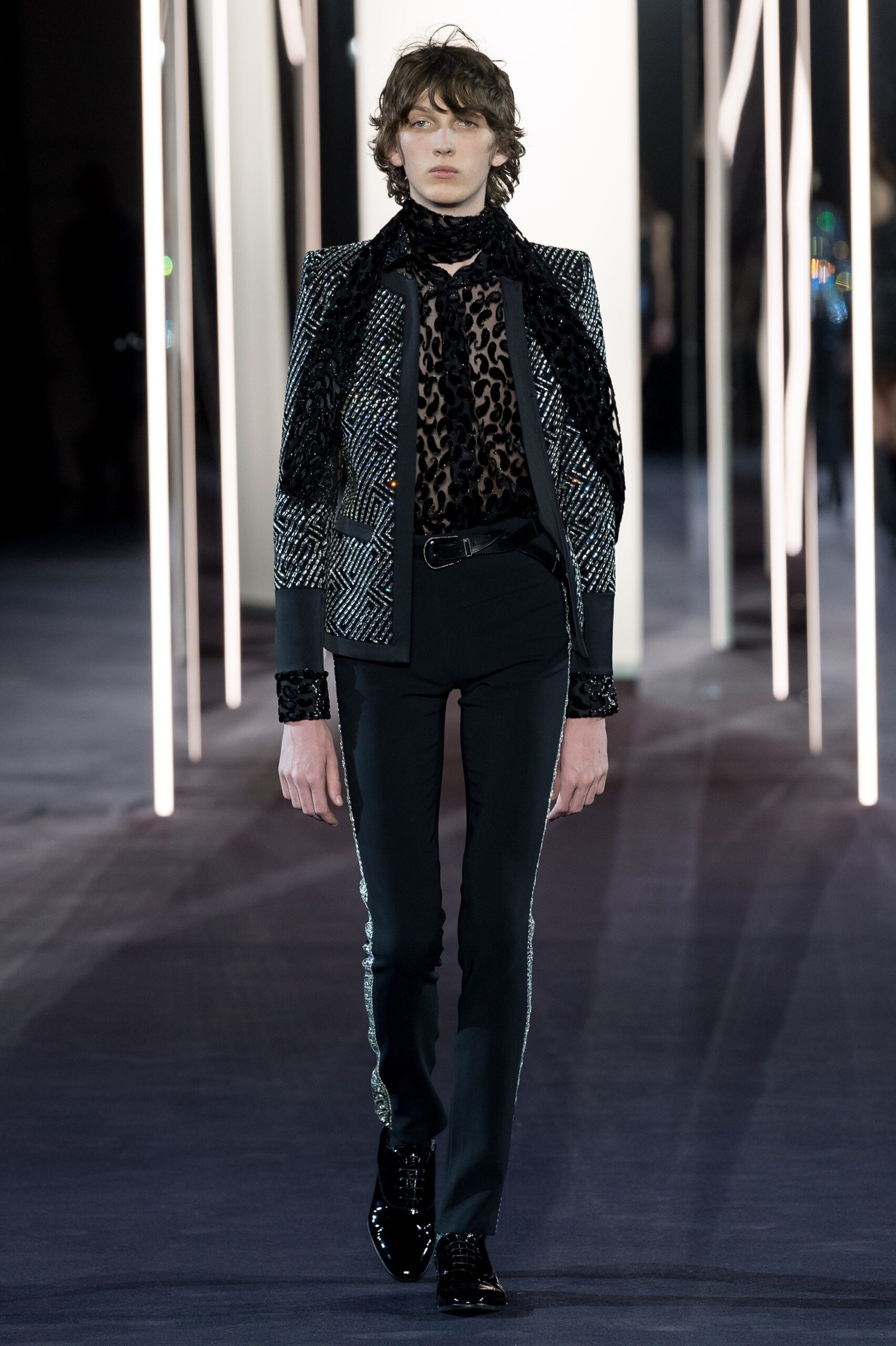 tailored black blazer with animal-print top