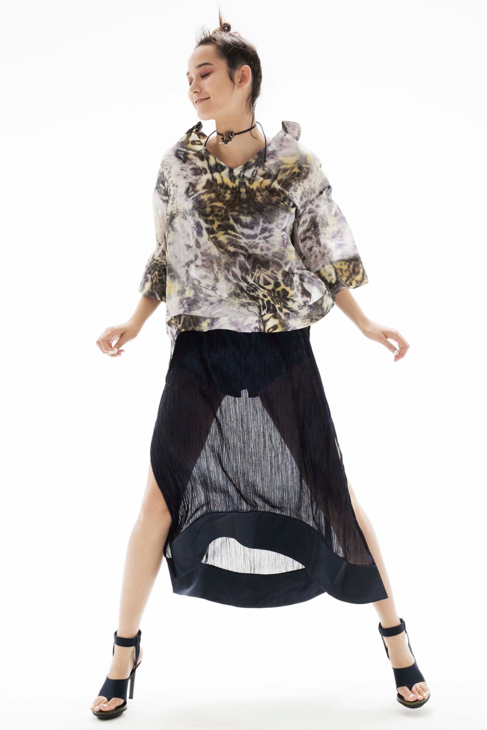 multi-colored silk top with black skirt