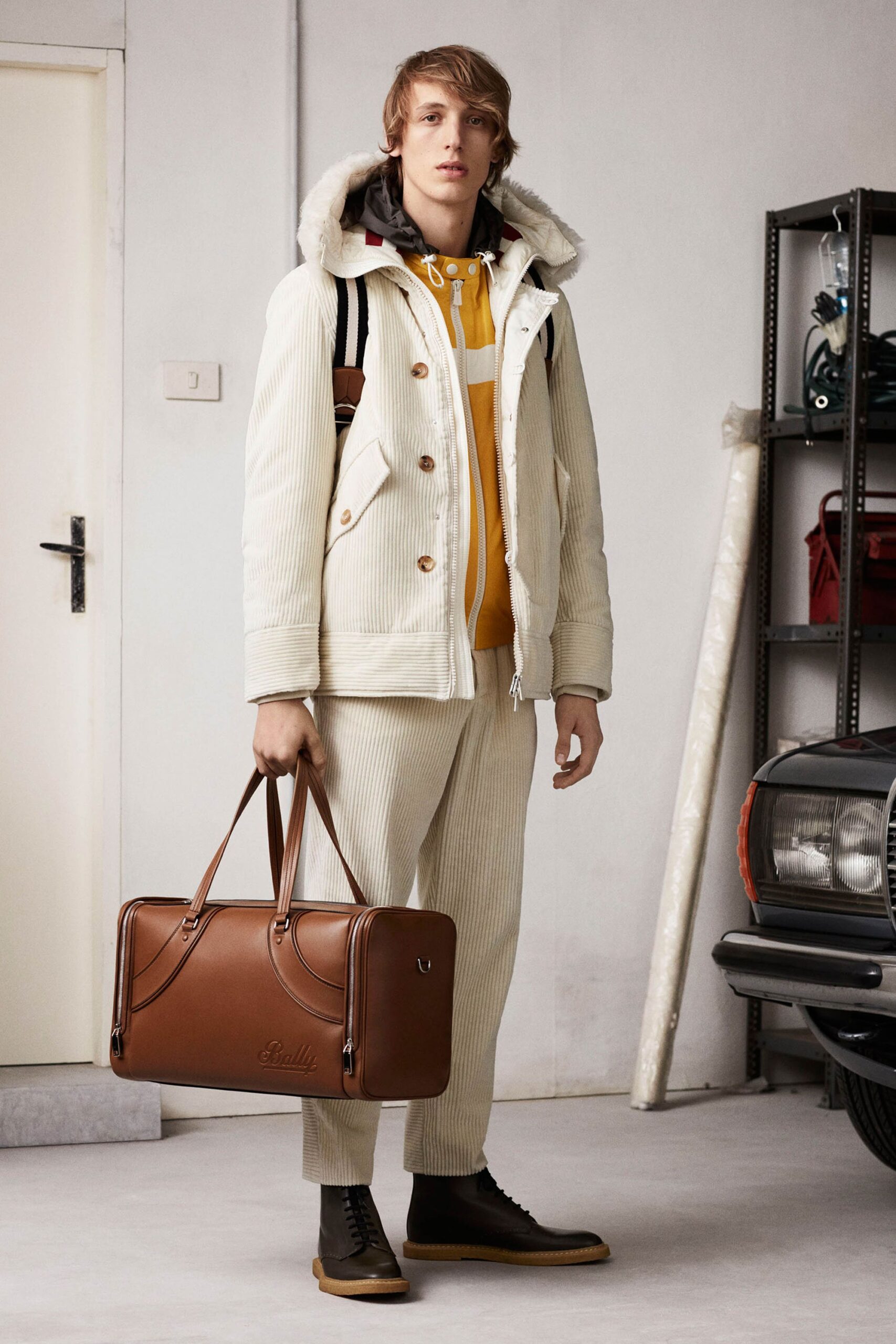 beige jacket with yellow hoodie