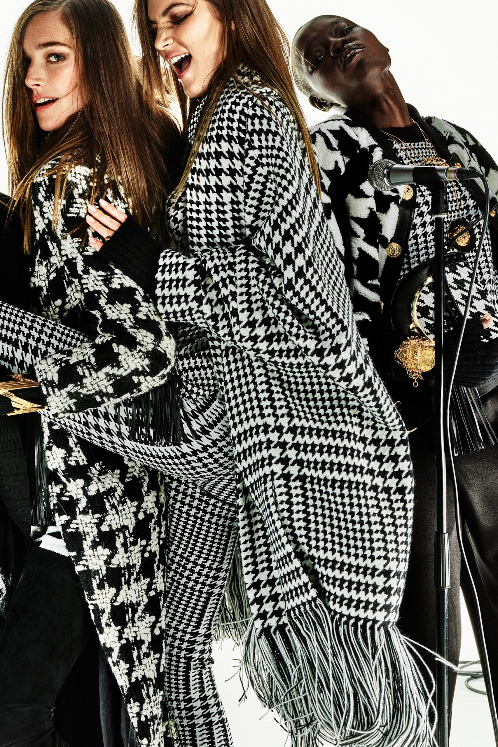 black and white checked coat with fitted pants