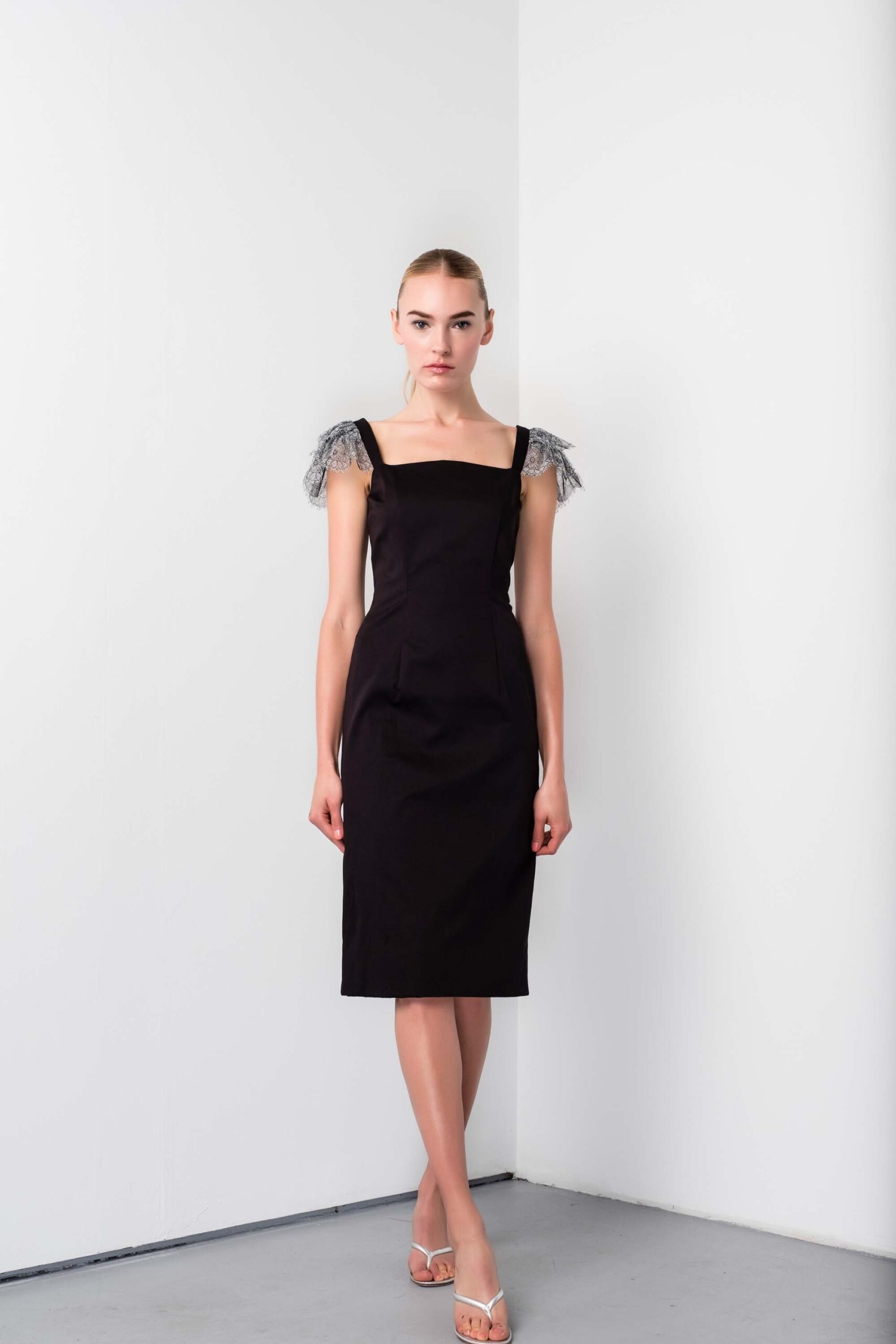 black fitted midi dress