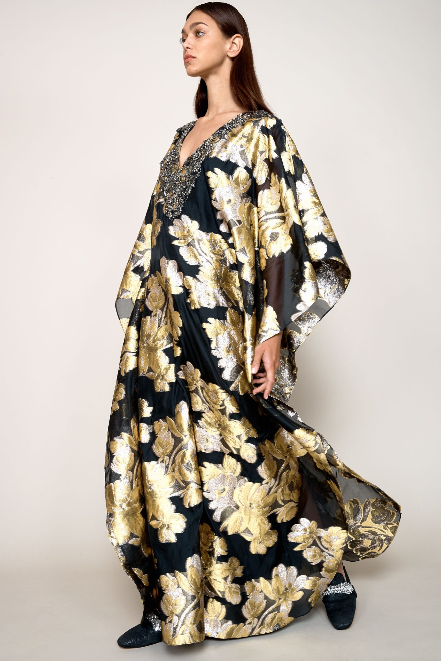 black and gold embroidered gown