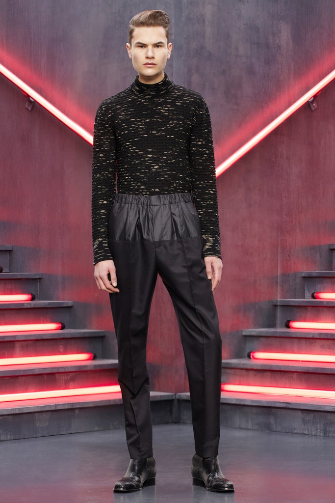 black fitted top and tailored pants