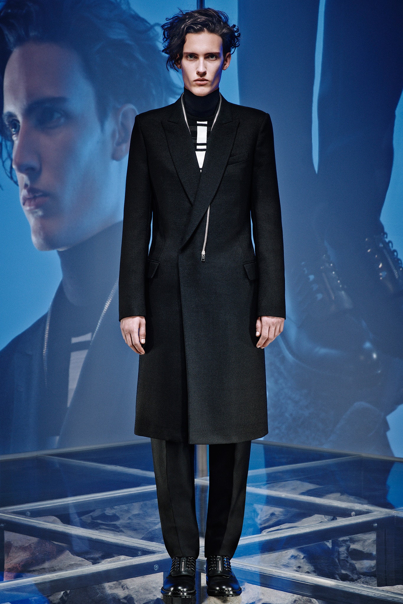 black tailored coat with slim pants