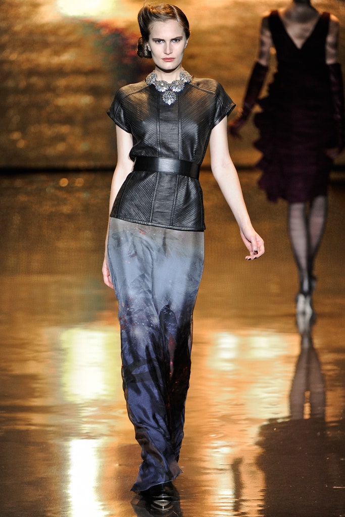 black leather fitted top and blue silk skirt