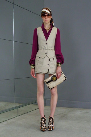 purple blouse beige vest shorts