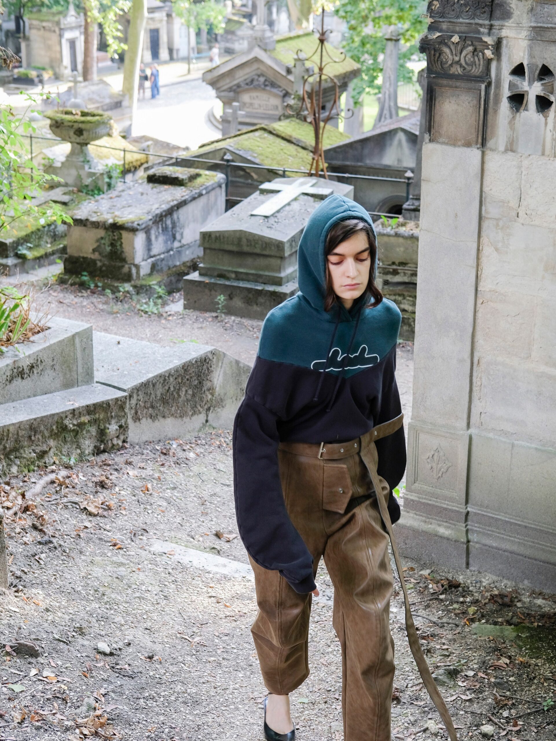 relaxed black and blue hoodie with brown pants