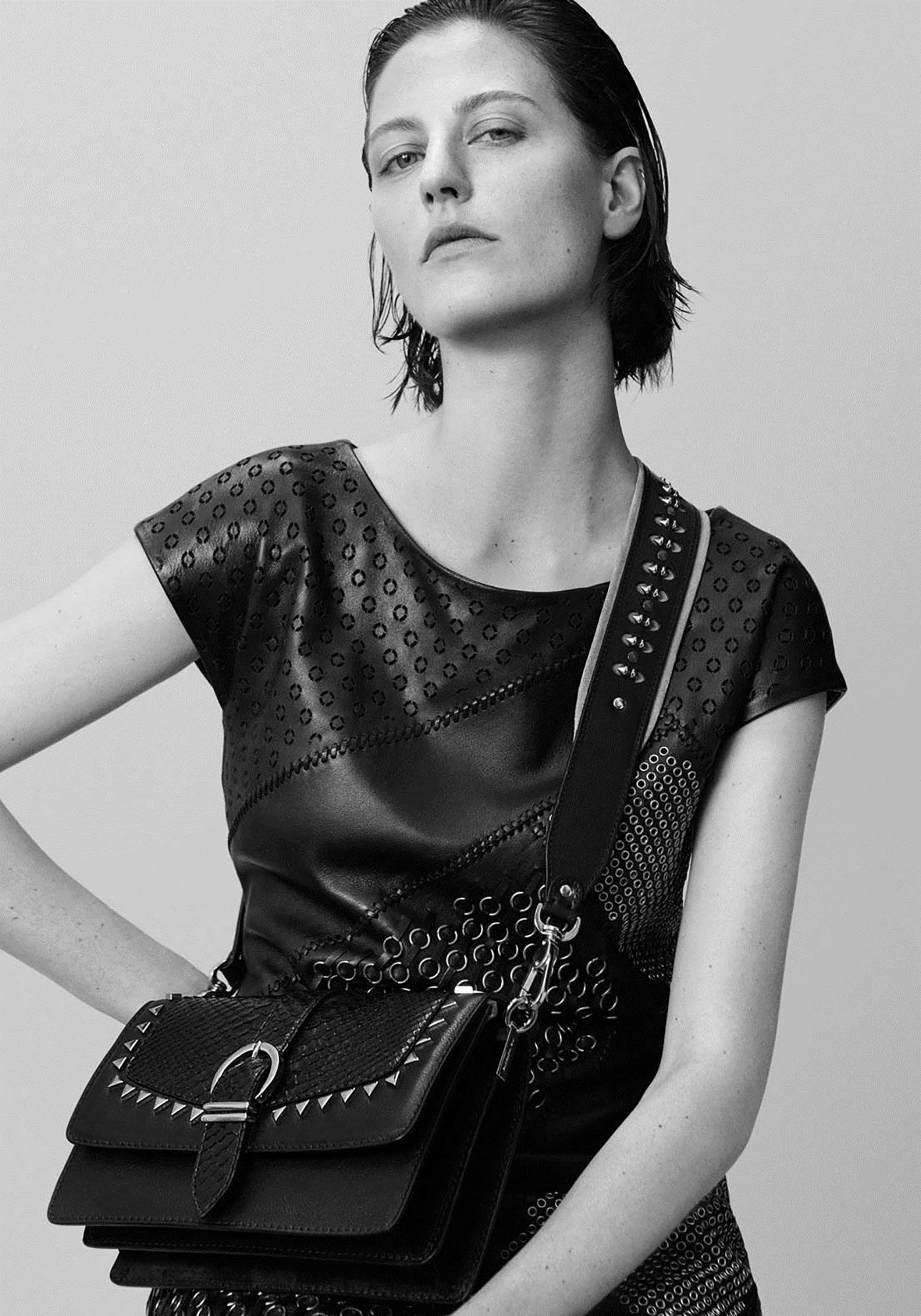 black leather fitted top and bag