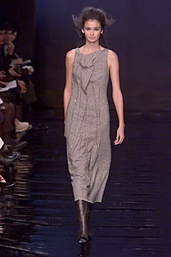 gray silk draped midi dress with black boots