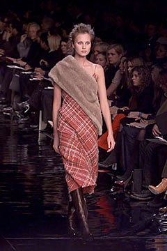 red plaid midi dress with faux-fur cape