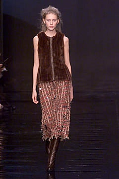 brown fur vest with fringed skirt