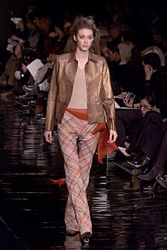 gold leather fitted jacket with plaid pants