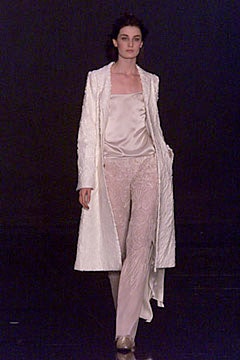 white embroidered coat with silk top and pants