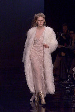 pink silk beaded gown with white faux-fur coat