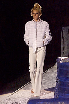 white pleated jacket and tailored pants