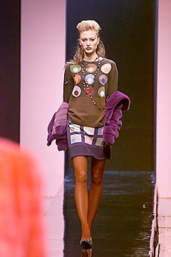 brown printed sweater with purple skirt