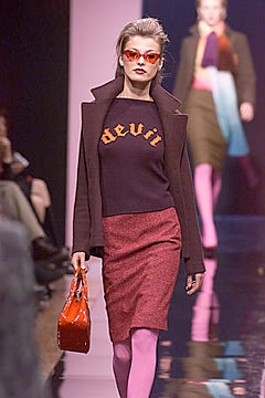 black fitted top with red skirt