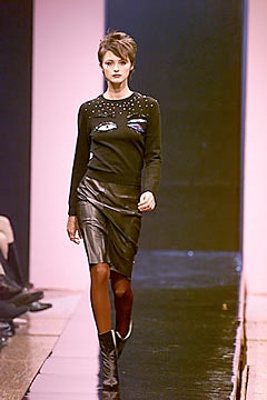 black fitted top and leather skirt