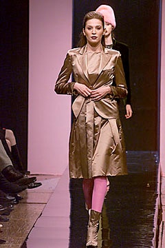gold silk fitted coat and skirt
