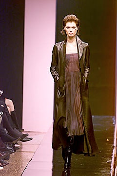 black leather coat and purple dress