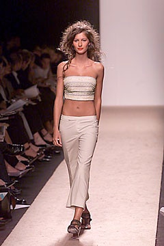 white strapless top and beige pants