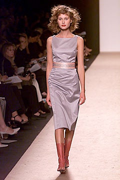 gray silk fitted midi dress with pink boots