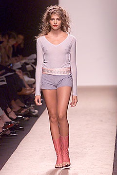 gray fitted top with blue shorts