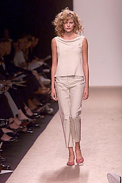 beige silk sleeveless top with tailored pants