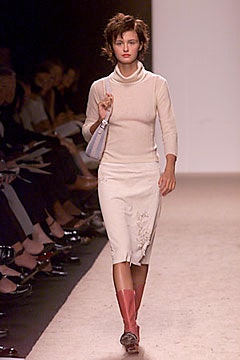 beige fitted turtleneck top with white pencil skirt