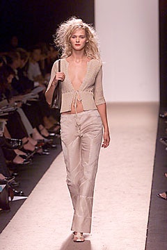 beige fitted cardigan and relaxed pants