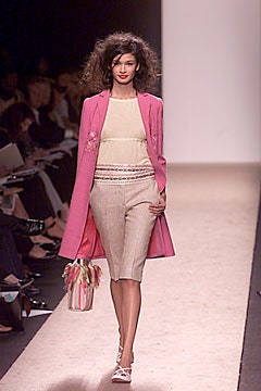 pink coat with beige pencil skirt
