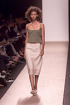 green cropped top and beige midi skirt