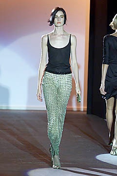 green fitted pleated shiny pants