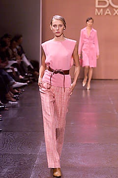 pink fitted top and tailored pants